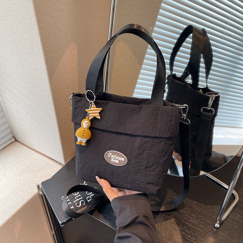 Stylish women's shoulder bags 2025 Large capacity student tote bag New canvas commuter handbag Women's eco-bag Cute canvas bag Women's handbag shoulder bag Japanese Harajuku crossbody bag Girls' small