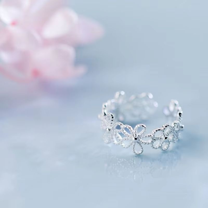 Silver hollow flower adjustable ring, ladies' engagement ring, retro luxury jewelry new product