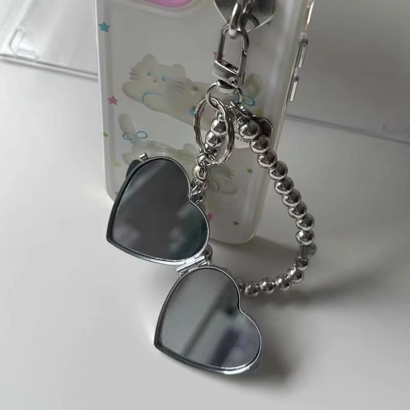 Fashionable metal bead shaped keychain, women's sweet mirror bag pendant keychain, bag hanging chain, mini heart-shaped double-sided makeup mirror pendant, creative and personalized keychain