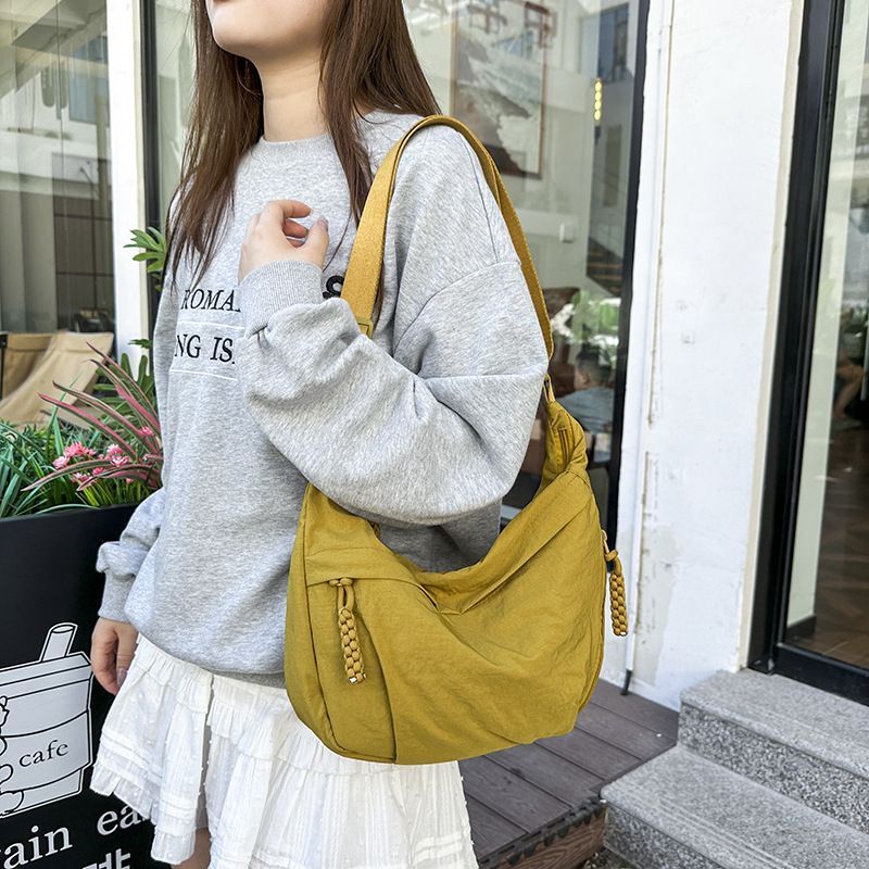 Dumpling bag, women's bag, 2025 new Korean version, niche autumn and winter style, lightweight single shoulder crossbody bag, casual armpit bag