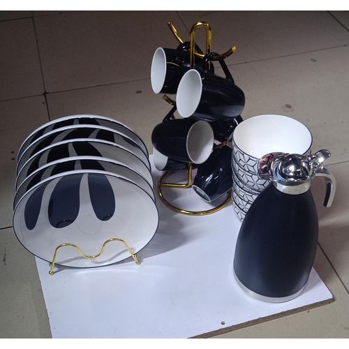 🎇PRICE DROPPED😶‍🌫️SUNDABESTS 19pcs black and white dinner set🤩This is a breakfast set that consists of 19 pieces. This includes; 6 cups, 6 ceramic plates,6pcs bowls a classy breakable 2litres flas