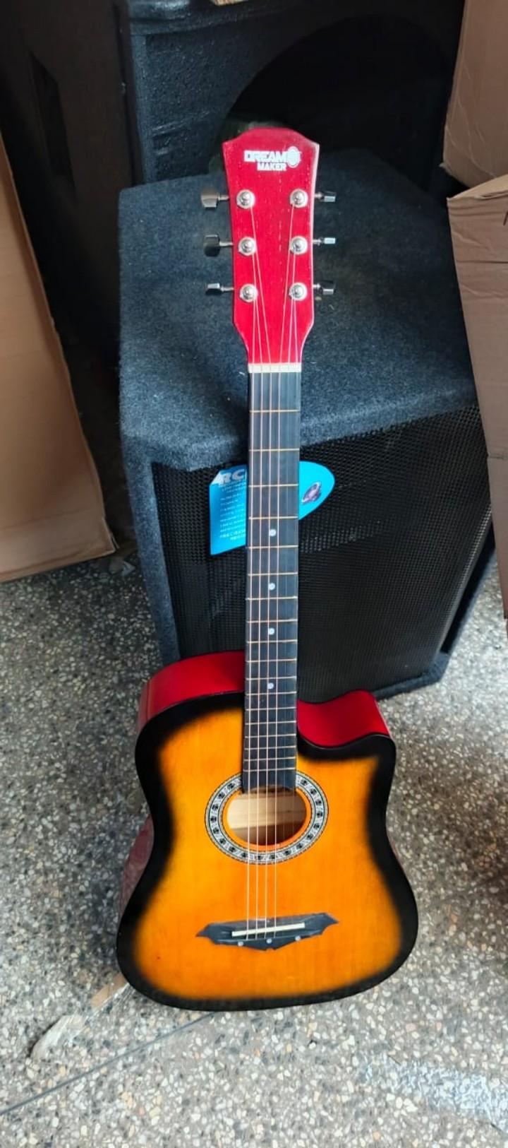 Semi-Acoustics guitars 38" plus Guitar pick, Bag and a Shoulder strap.