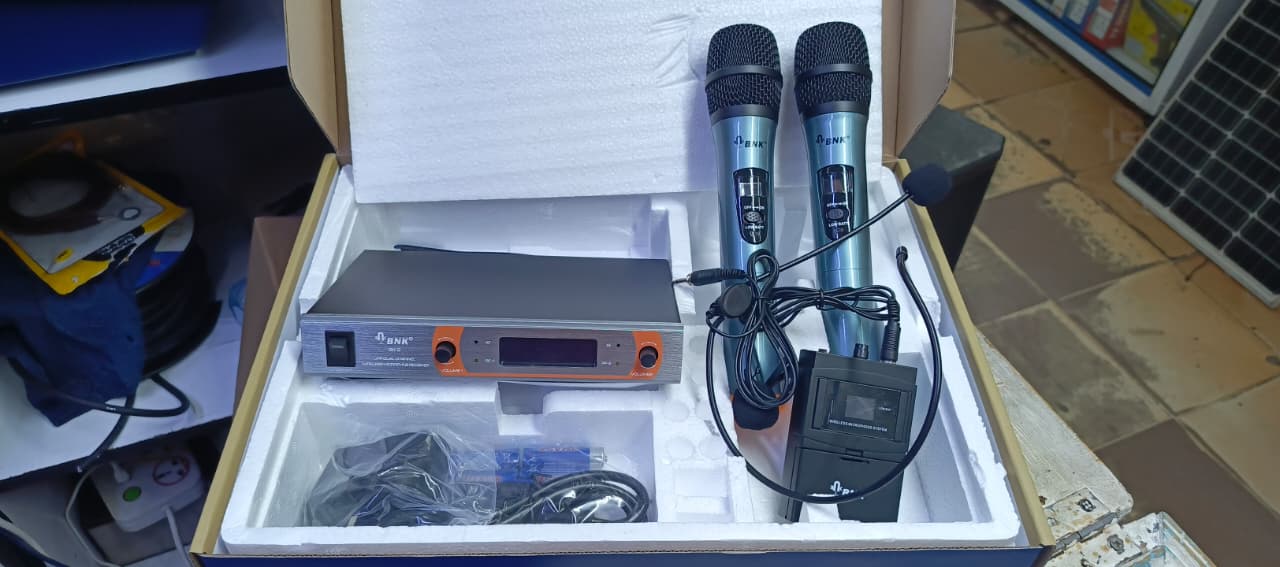 Bnk BK9/4 in 1 Professional Wireless Microphone with 2 hand held, lapel and head wireless microphone