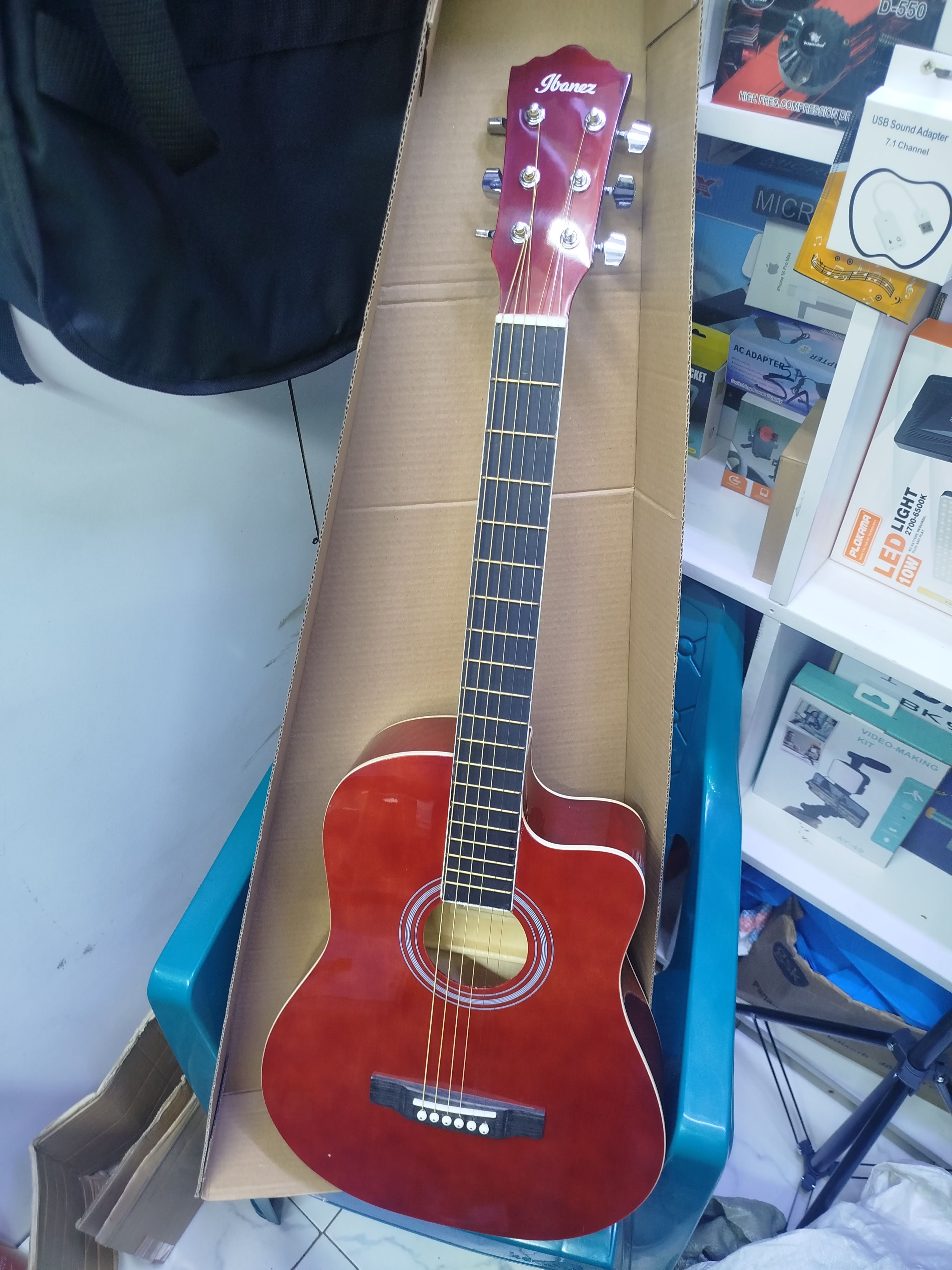 Semi-Acoustics guitars 38" plus Guitar pick, Bag and a Shoulder strap.