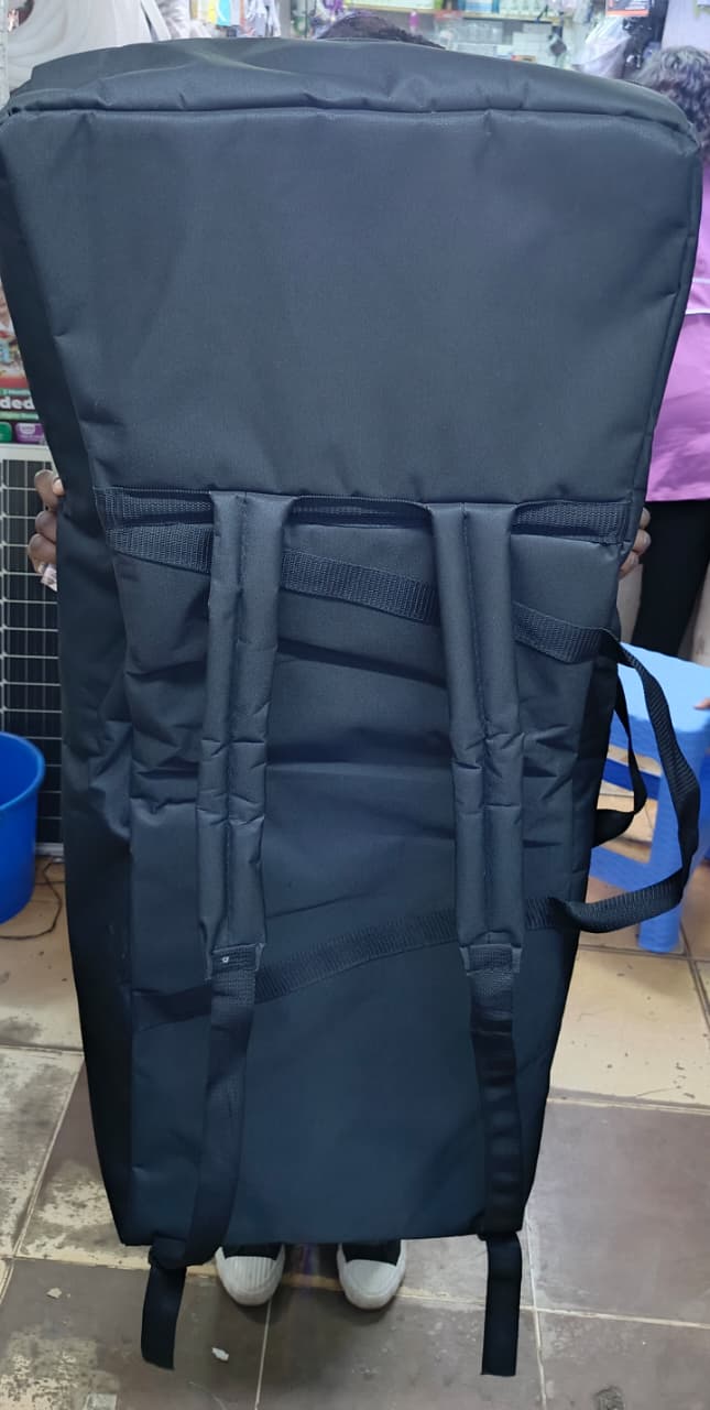 Custom-Made padded keyboard bag for 61-keys keyboards. fitted with heavy back straps and side pockets