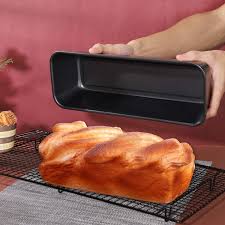 OFFER!! OFFER!! Durable non-stick carbon steel toast pan designed for perfect bread, toast, and cakes. Even heat distribution, easy to clean, and ideal for home baking in ovens and toaster ovens.