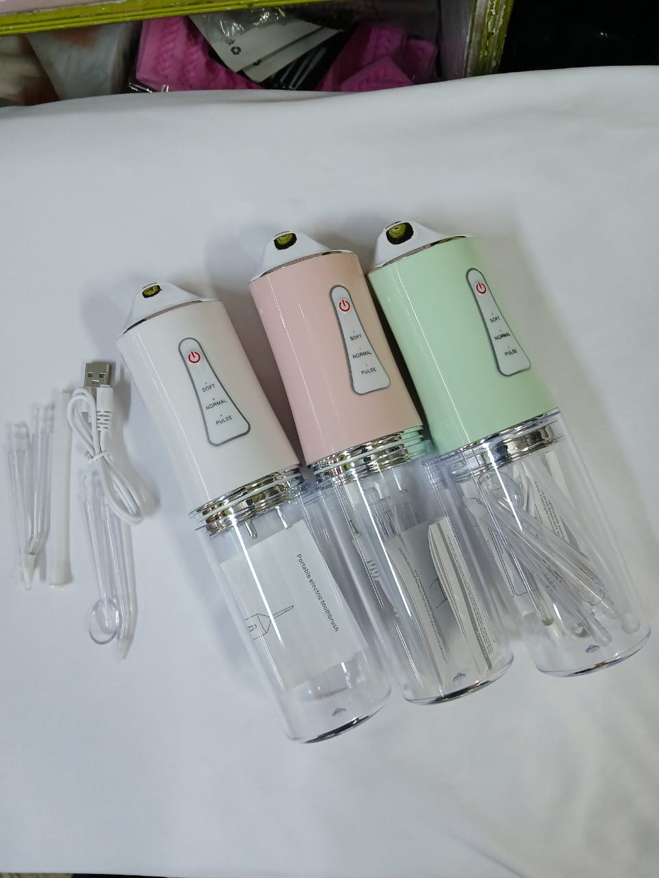 🦷 SMILE BRIGHT DEAL! Rechargeable Portable Oral Irrigator. Includes 4 nozzles for deep cleaning between teeth. Waterproof, cordless and perfect for travel or braces. BUY NOW for professional care!