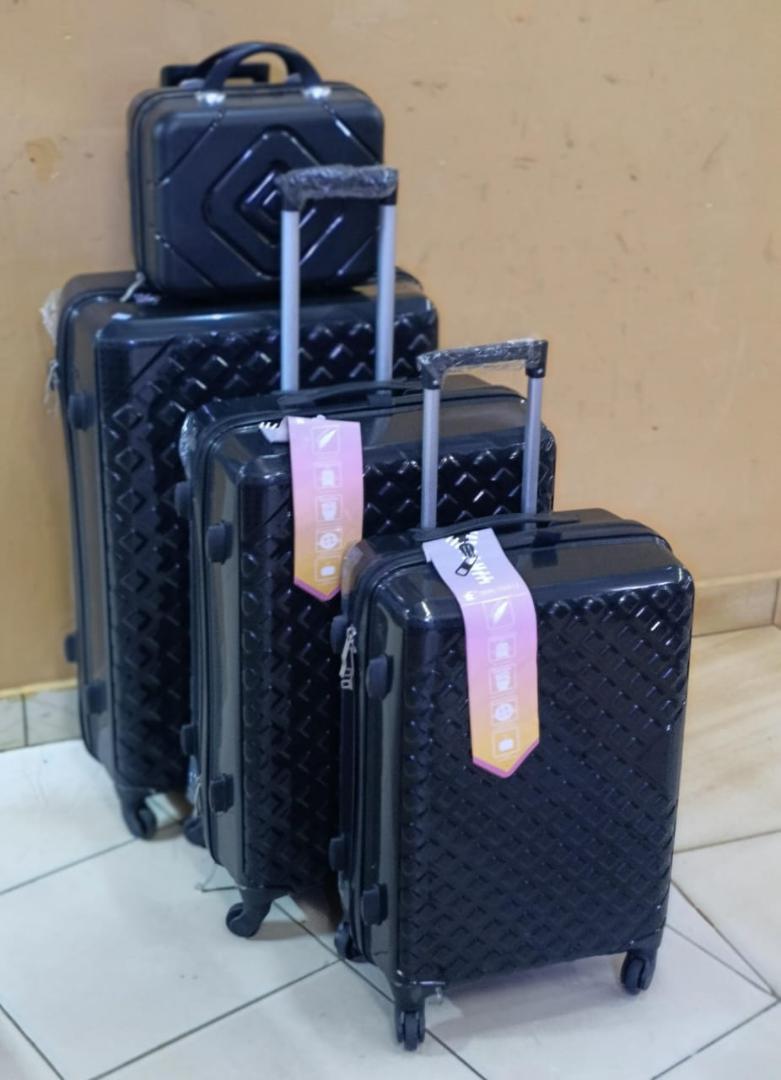 PRICE DROP‼️‼️‼️‼️
*4 in 1 Luxurious unbreakable Suitcase*

▪️Zipper closure frame.
▪️360 Easy-glide spinner wheels. 
▪️Telescopic handle system locks in multiple levels to adapt.
▪️Compression straps