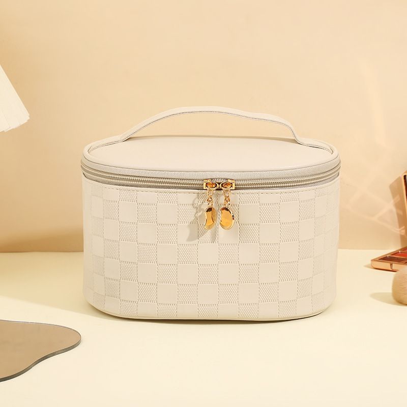 Minimally designed checkerboard makeup bag for women with a high-end feel, large capacity storage bag, waterproof handheld travel portable toiletry bag