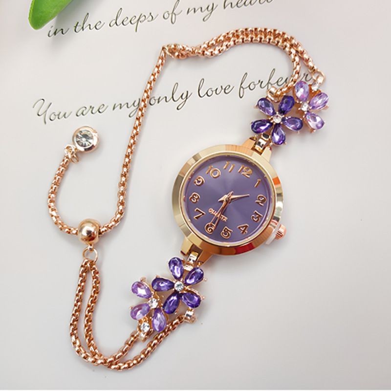 New women's niche fashion diamond inlaid watch flower shaped digital women's watch female model student pull-out bracelet watch