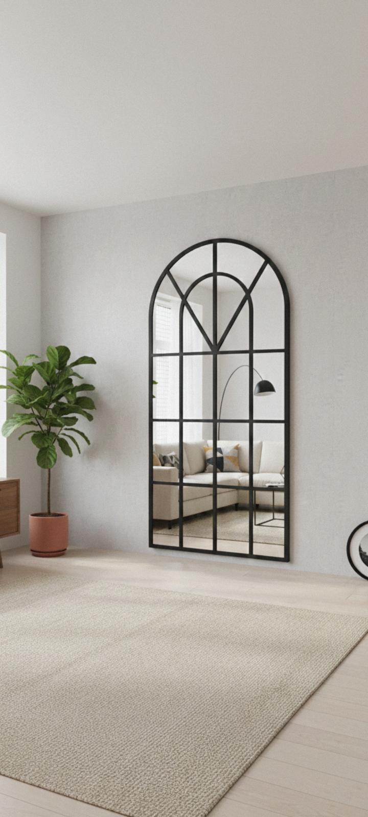 Arched cathedral window full-length mirror-black frame.