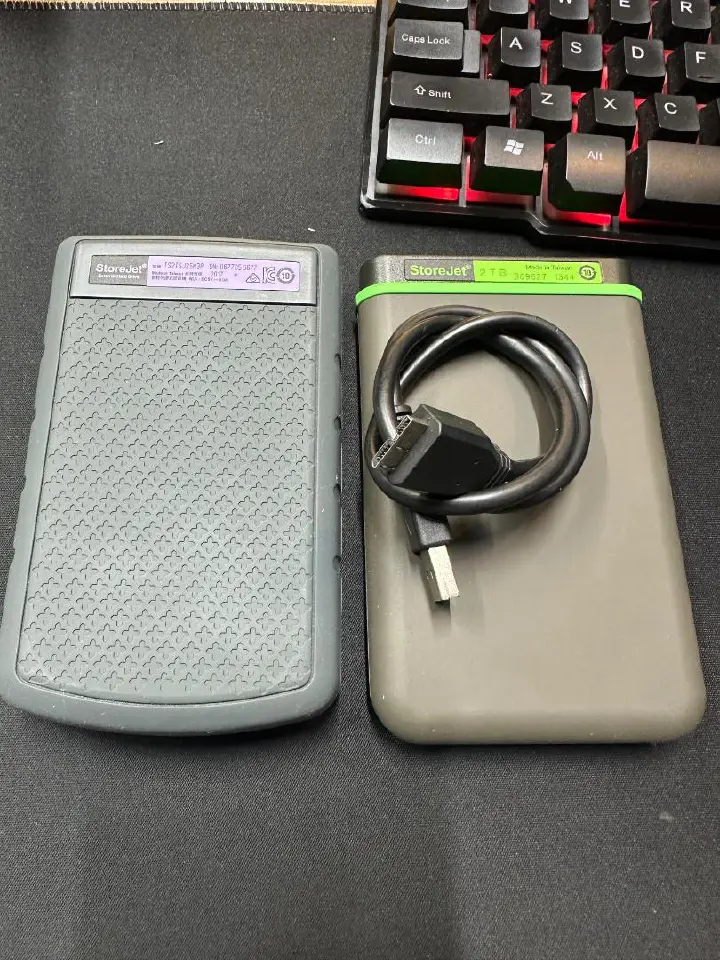 USED Transcend StoreJet 25M3 1TB / 2TB Portable External Hard Drive – USB 3.1 Gen 1, Military-Grade Shockproof Design, One-Touch Auto Backup, High-Speed Data Transfer for PC, Mac & Gaming Consoles