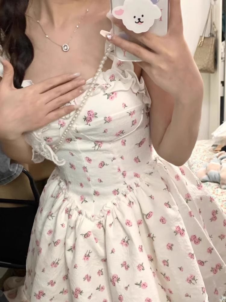 French white floral suspender dress for women's summer new style spicy girl pure desire wind, waist cinching and slimming princess fluffy skirt