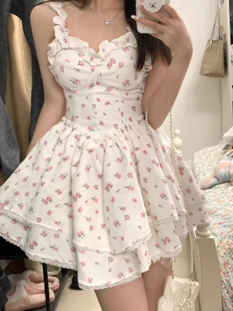 French white floral suspender dress for women's summer new style spicy girl pure desire wind, waist cinching and slimming princess fluffy skirt