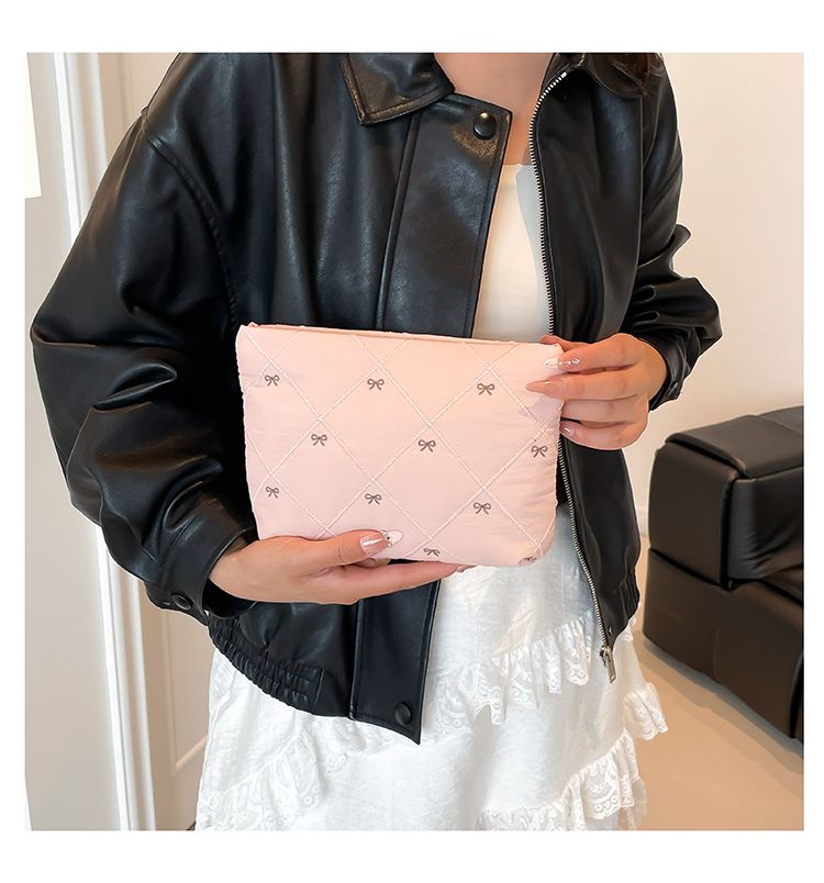 Butterfly knot pattern is fashionable and versatile. Quilted embroidery thread grid filled cotton makeup bag, casual hand-held bag, warm down small bag, inner bag, wash bag, pen bag, travel bag