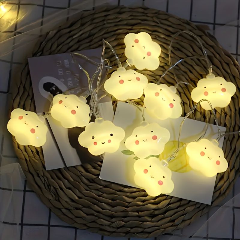 1 set of cloud shaped LED string lights with a smile, made of plastic material and powered by batteries (excluding batteries), requiring 2 AA batteries. Suitable for hanging decorations for birthday c