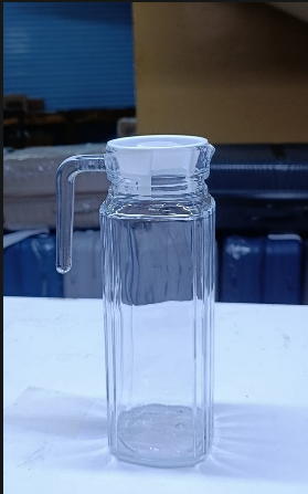 1.3L WATER,JUICE GLASS JUG High-quality glass construction Elegant and functional design Perfect for serving juice, water, and more Easy to clean and maintain Adds a touch of class to any table set