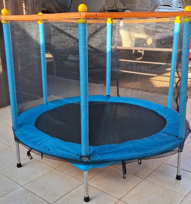 4 ft Kids Trampoline with Safety Net Plus Basketball, Hoop and Soft Pit Balls