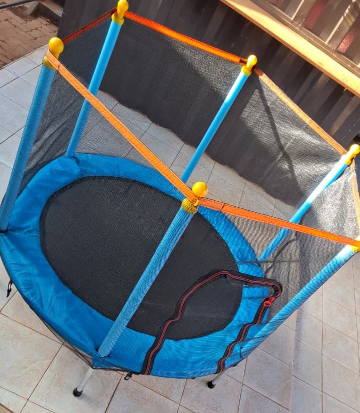 4 ft Kids Trampoline with Safety Net Plus Basketball, Hoop and Soft Pit Balls