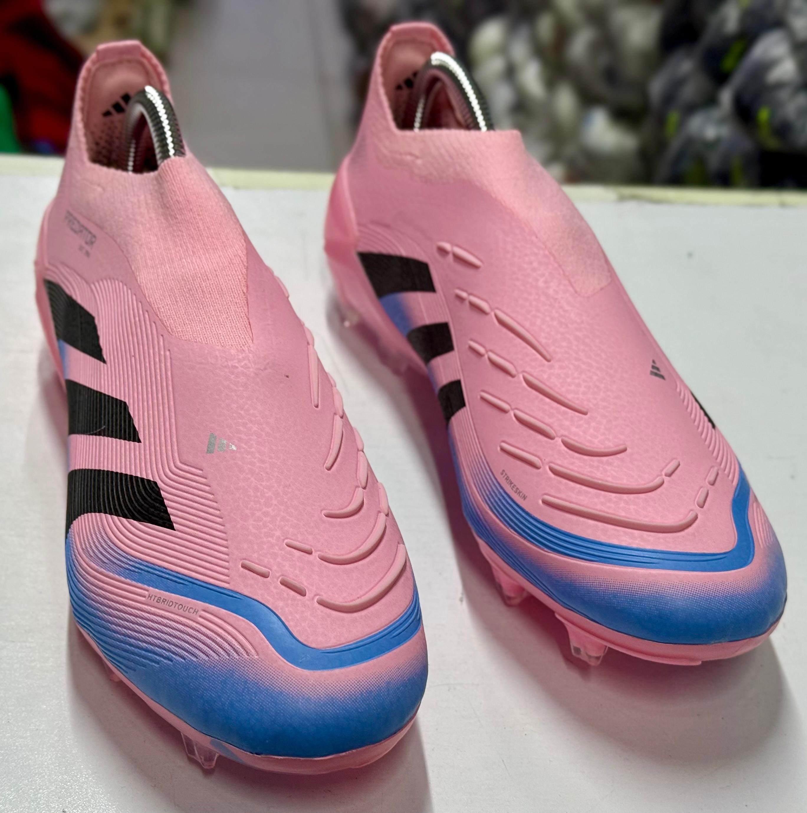 Predator Elite Laceless FG Football Boots in the "Pink Miami Beckham" edition. 
Colorway: Bright pink, black, and white, inspired by David Beckham and matching the Inter Miami kit. 
Design: Laceless u