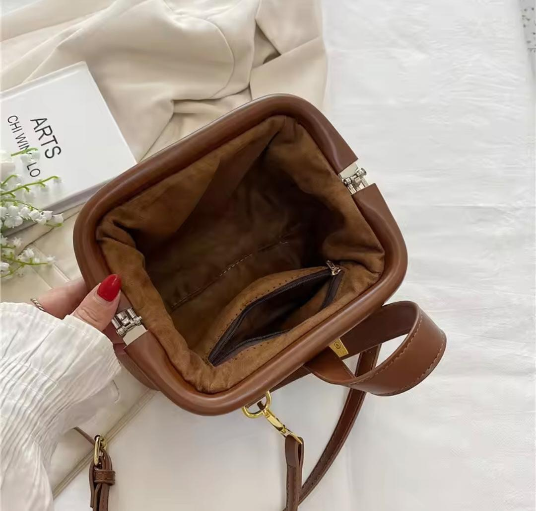 Vintage Wasini sling Bag. Available in colors Black and Beige. Fashionable, Elegant and Classy