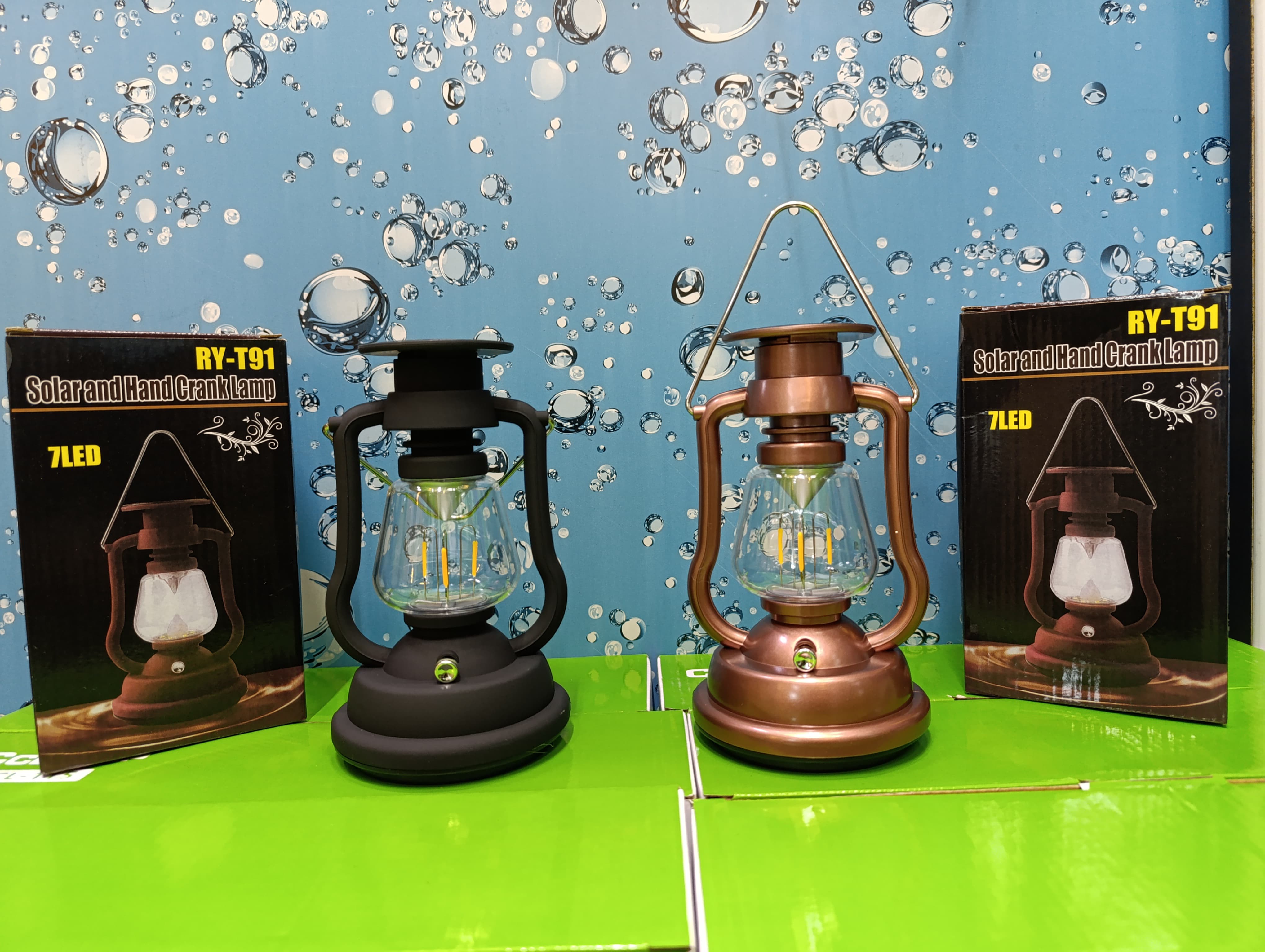 RY-T91 Solar and Hand Crank Lamp". These are portable lanterns designed for use in various situations, such as camping or during power outages. 
Key features of this type of lamp include:
Dual Chargin