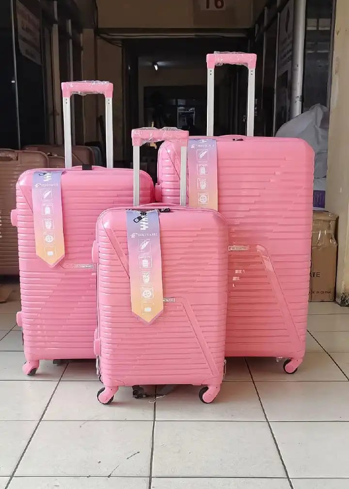 A Size 28  large suitcase. Made of unbreakable rubber.Has a double zipper. Has a  built-In TSA lock, a set of 360-degree wheels and a telescopic handle. Has a capacity of 23 Kg. Has a pinlock sy