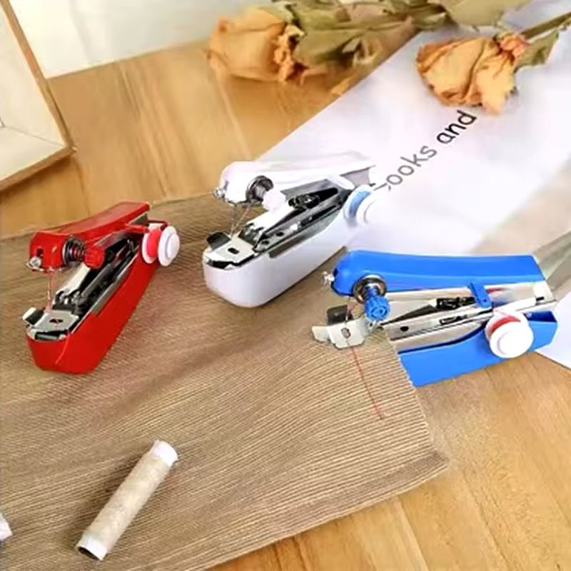 - Home Handheld Sewing Machine Protable Outdoor Travel Clothes Fabrics DIY Stitchin Sew Tool Mini Manual Stitch Needlework Machine