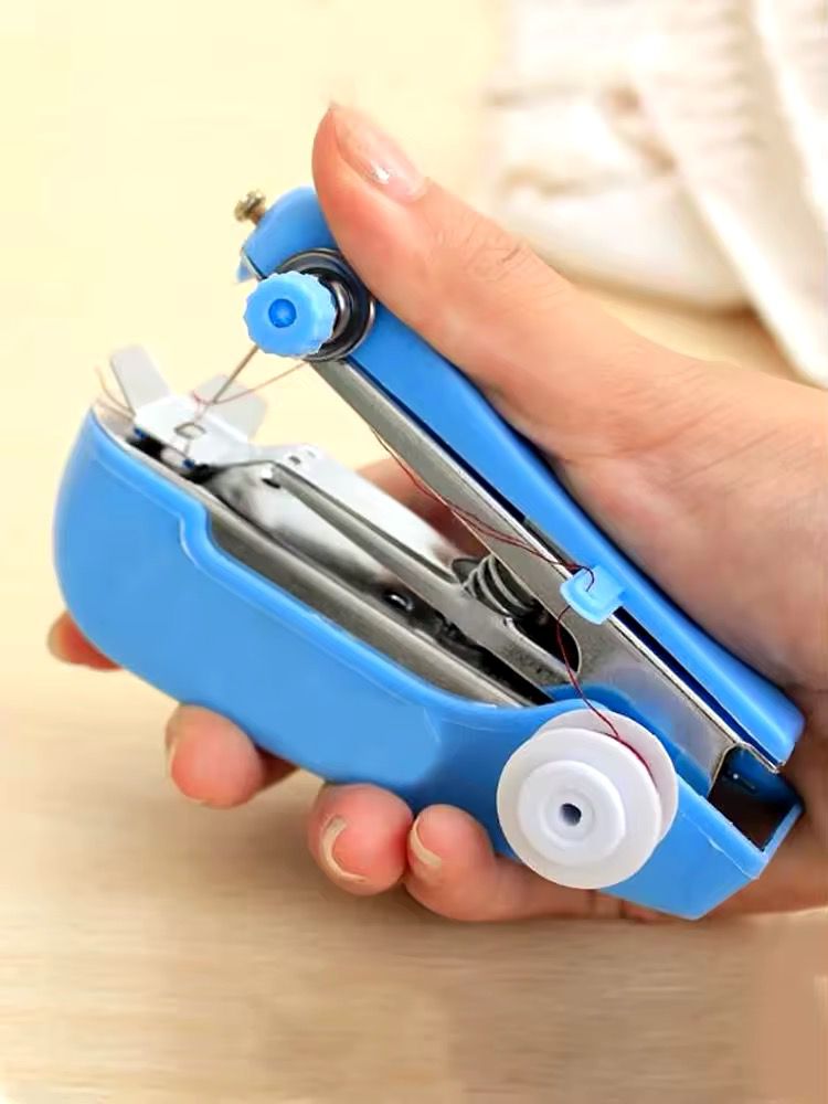- Home Handheld Sewing Machine Protable Outdoor Travel Clothes Fabrics DIY Stitchin Sew Tool Mini Manual Stitch Needlework Machine