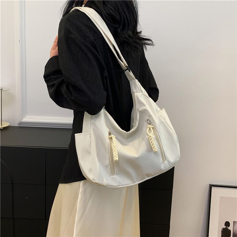 Fashionable large capacity versatile simple handbag travel bag student internet celebrity new wholesale women's shoulder crossbody bag
