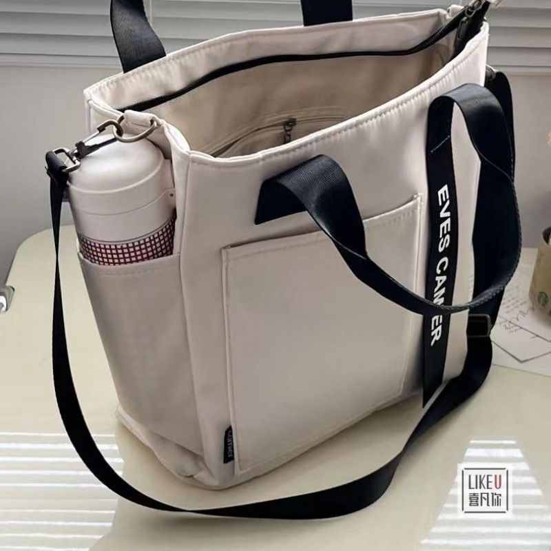 New design waterproof and stylish tote canvas hand-held crossbody bag, simple and versatile, single shoulder hand-held bento lunch box bag Style_1 AS PICTURE