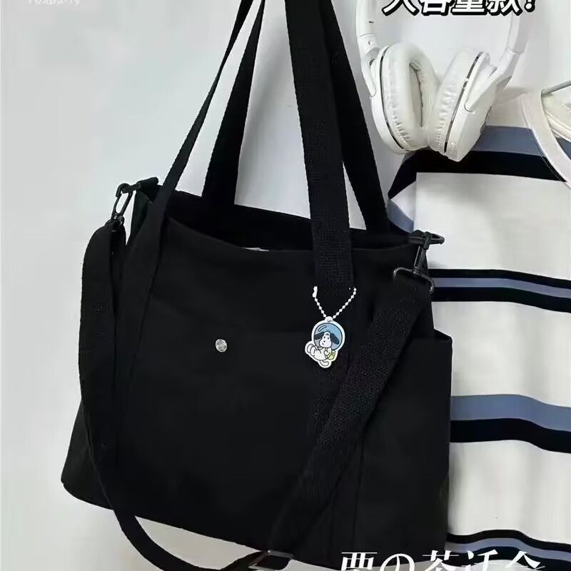 Canvas bag women's new large capacity shopping versatile shoulder bag tote bag work commuting bag Korean version diagonal cross bag black AS PICTURE