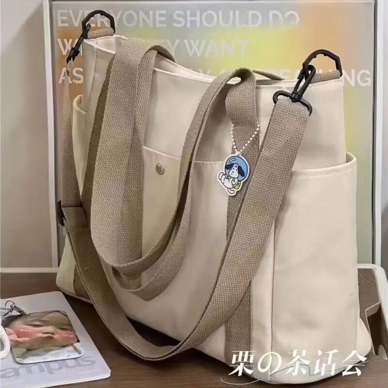 Canvas bag women's new large capacity shopping versatile shoulder bag tote bag work commuting bag Korean version diagonal cross bag black AS PICTURE