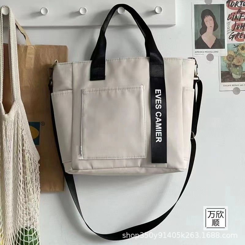 Original Design Waterproof and Stylish Tote Canvas Handheld Crossbody Bag Simple and Versatile One Shoulder Handheld Bento Meal Box Bag black AS PICTURE