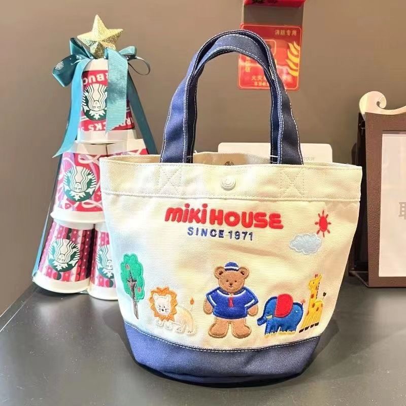New cartoon canvas bucket bag with contrasting colors, fashionable handbag, popular item on Little Red Book, makeup bag, lunch box bag, women's bag little bear AS PICTURE