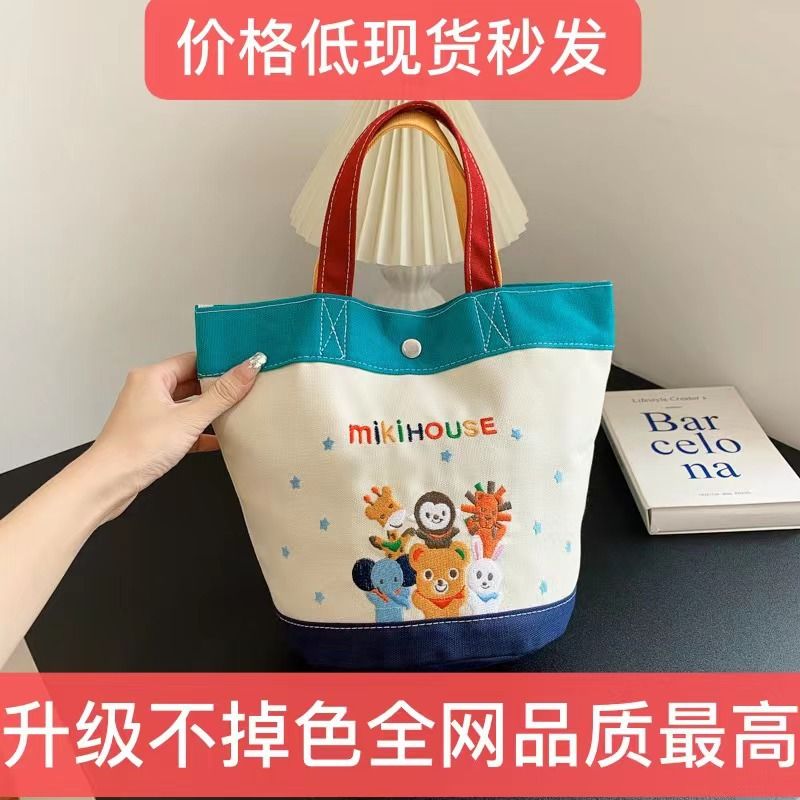 New cartoon canvas bucket bag with contrasting colors, fashionable handbag, popular item on Little Red Book, makeup bag, lunch box bag, women's bag little bear AS PICTURE