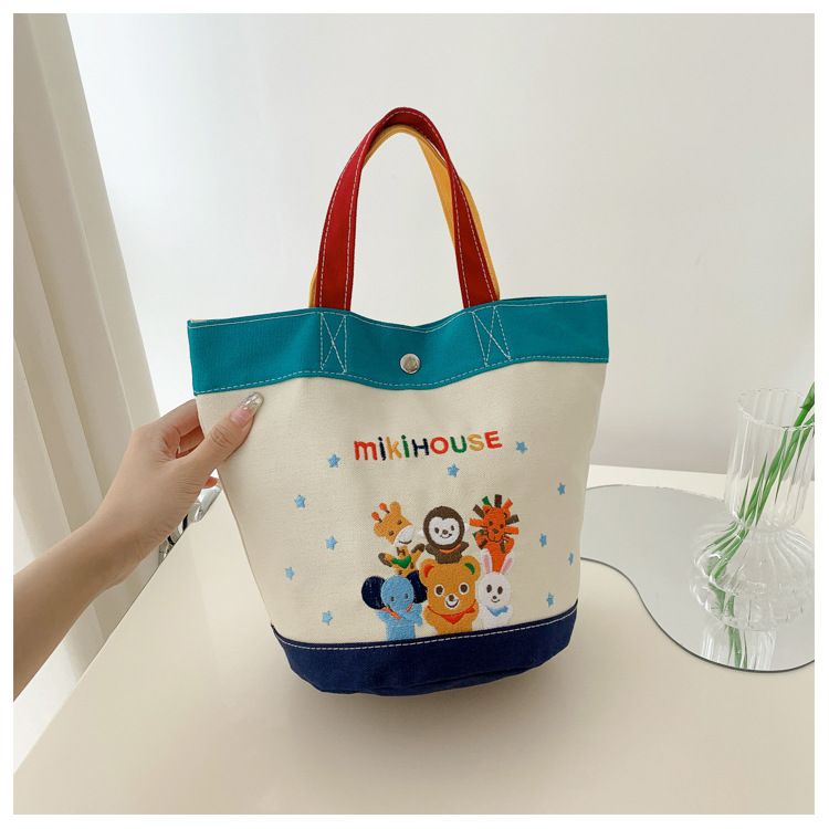 New cartoon canvas bucket bag with contrasting colors, fashionable handbag, popular item on Little Red Book, makeup bag, lunch box bag, women's bag little bear AS PICTURE