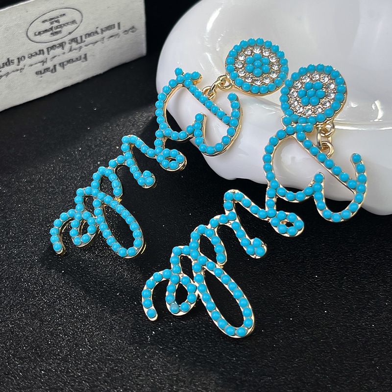 Cross border New Exaggerated Design with Rice Beads English Letter Bride Wedding Earrings Cross border Wholesale milky white AS PICTURE