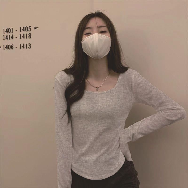 Long sleeved T-shirt women's autumn and winter new trend ins irregular slim fit student casual short top girl base shirt black S