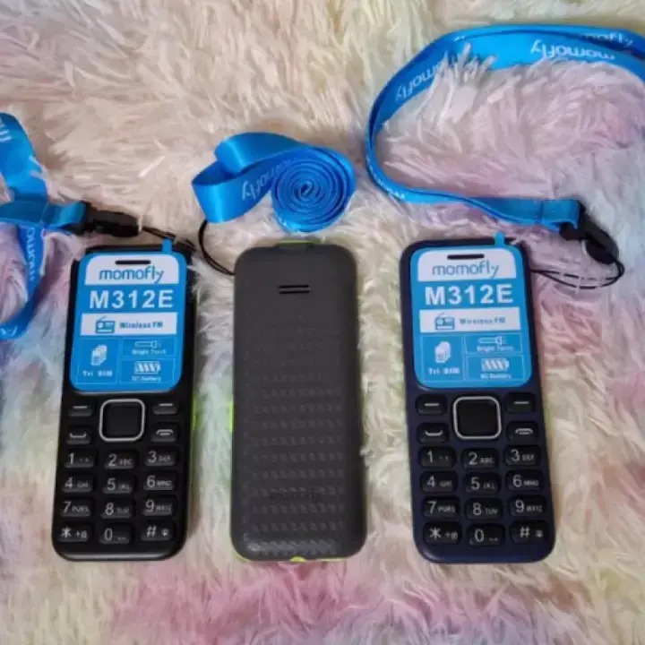 [ NEW ARRIVAL ] Momofly M312E 32 MB RAM featured phone Triple SIM Regular 5C Battery, 1.77 Inch display with Bluetooth connectivity Wireless FM and Bright Torch featured phones