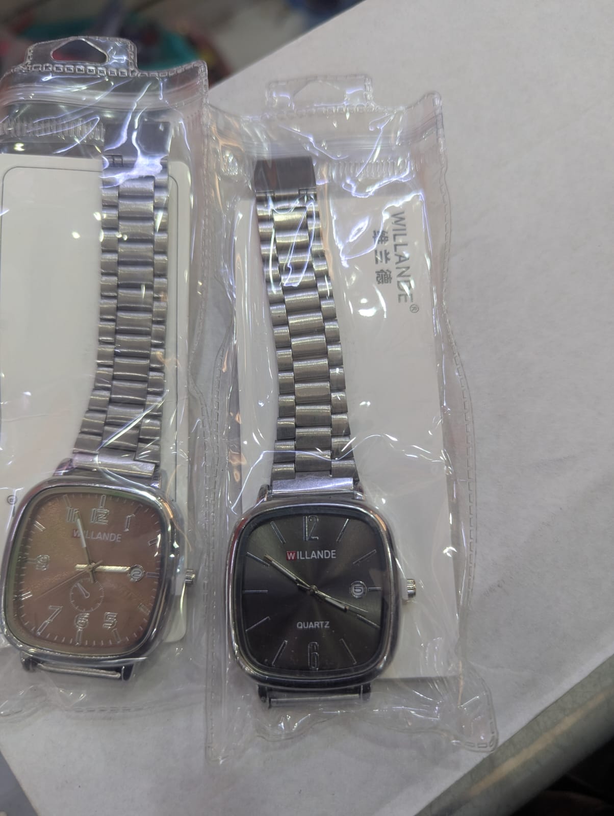 Willande square quartz wrist watch with stainless steel strap, date display, water resistant elegant design for men and women, casual and business fashion timepiece