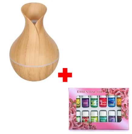 USB Aromatherapy Ultrasonic Humidifier and Scent Diffuser + 12pcs Different Scented Essential Oils. Keep the air moist and your home smelling lovely all at once!