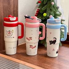 nsulated water bottles with handles and straw lids for both hot and cold liquid