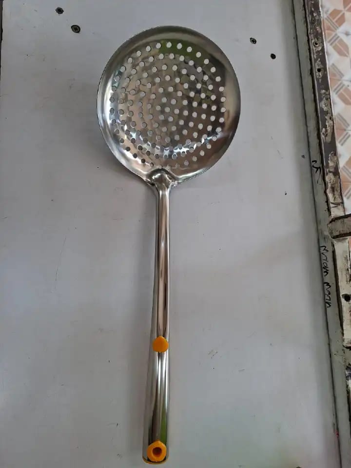 Mandazi spoon stainless steel for durability and rust resistance.