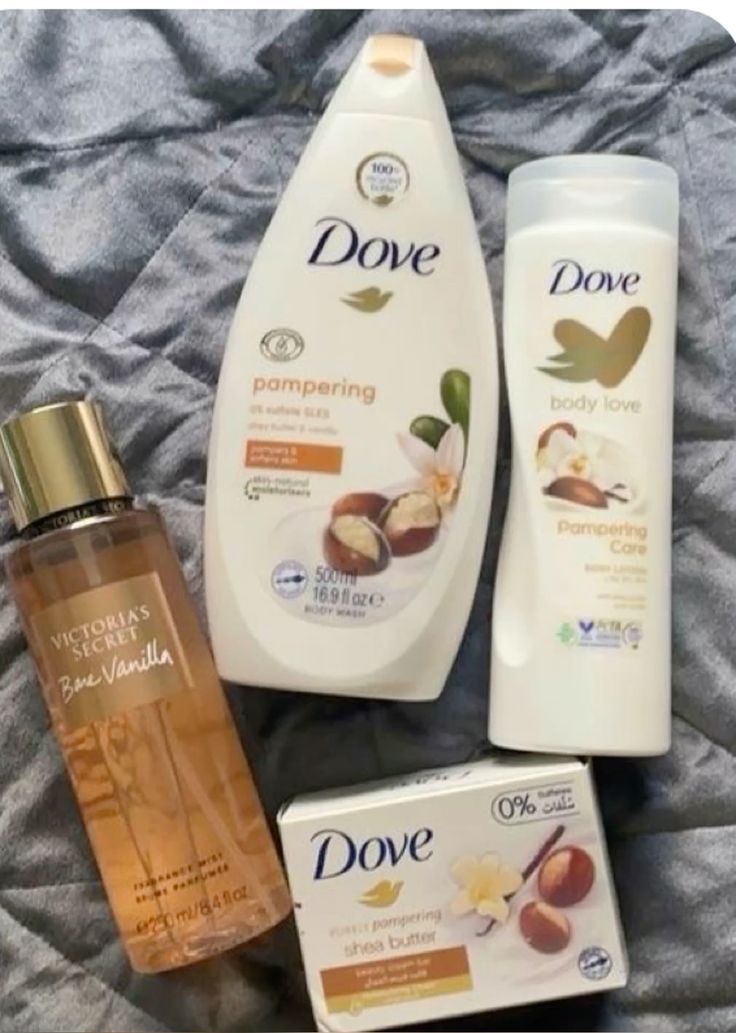 Dove shower gel,soap and lotion along with a Victoria's Secret body splash skin care set