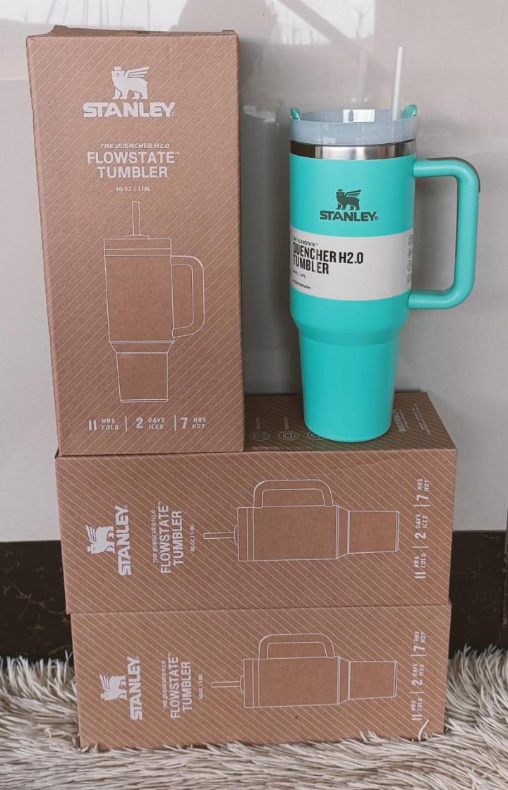 STANLEY CUPS. Stanley Quencher H2.0 FlowState Tumblers, FlowState lid features a rotating cover with three positions: a straw opening, a drink opening, and a full-cover top.