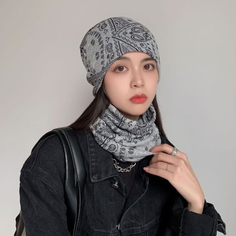 Slouchy Graffiti Head Band - Embrace effortless cool with our Slouchy Graffiti Knit Beanie! This lightweight and breathable cap is the ultimate accessory for achieving that relaxed.