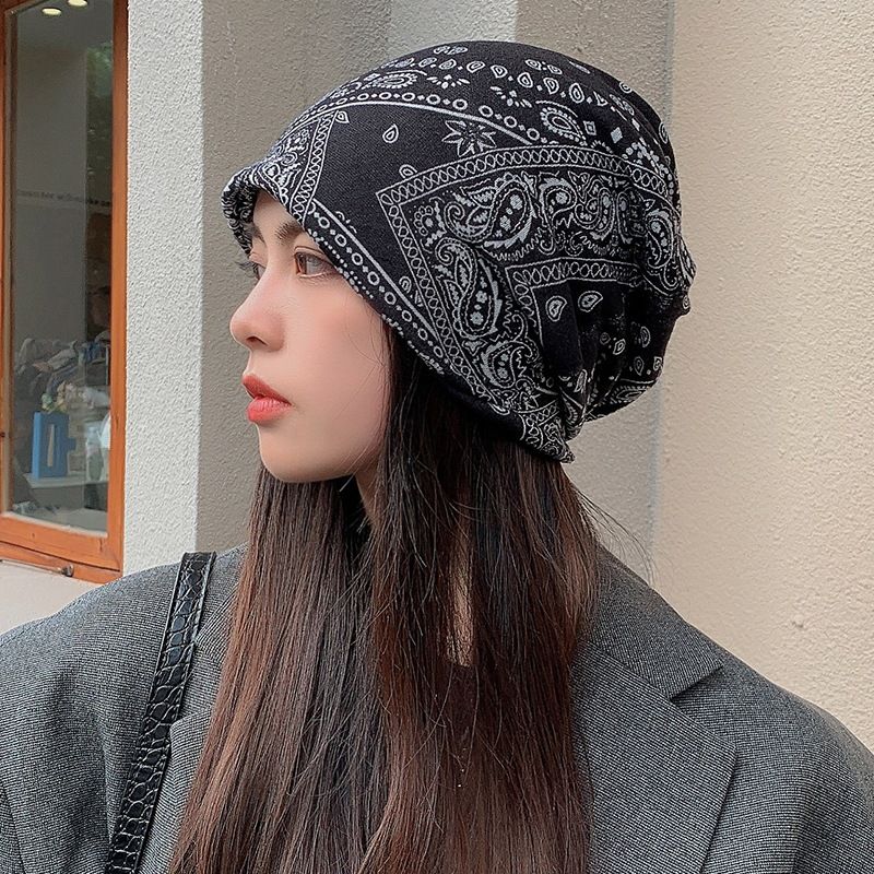 Slouchy Graffiti Head Band - Embrace effortless cool with our Slouchy Graffiti Knit Beanie! This lightweight and breathable cap is the ultimate accessory for achieving that relaxed.