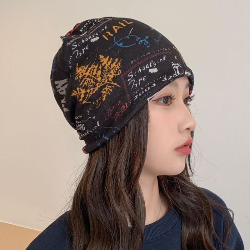 Slouchy Graffiti Head Band - Embrace effortless cool with our Slouchy Graffiti Knit Beanie! This lightweight and breathable cap is the ultimate accessory for achieving that relaxed.