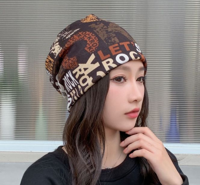 Slouchy Graffiti Head Band - Embrace effortless cool with our Slouchy Graffiti Knit Beanie! This lightweight and breathable cap is the ultimate accessory for achieving that relaxed.